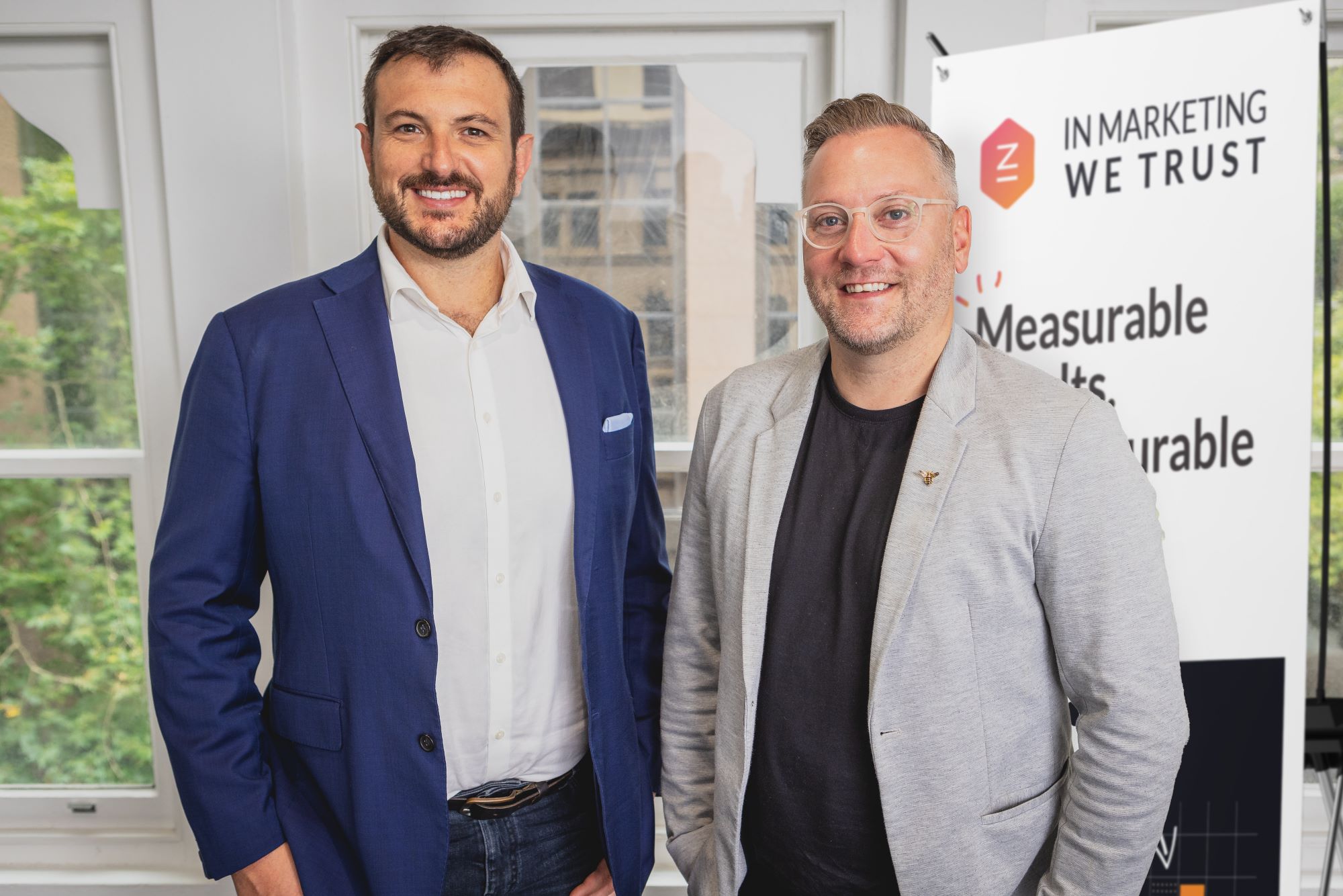 In Marketing We Trust celebrates dynamic growth with rebrand