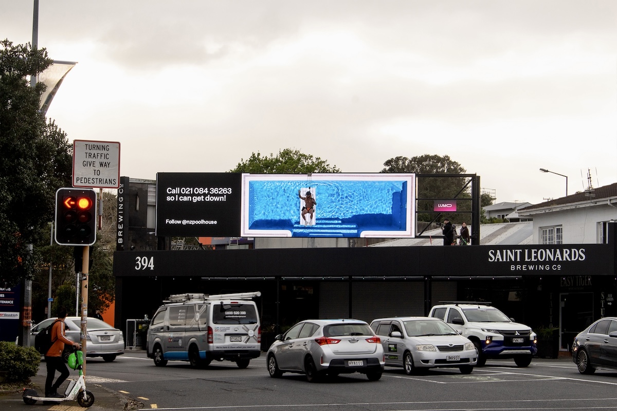 A pool, a billboard, an inflatable boat and bright orange Speedos: The PoolHouse owns pool culture in new campaign via Crave Global